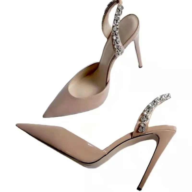 Women's pointed toe high heel sandals with rhinestone decoration on the side, in patent leather.