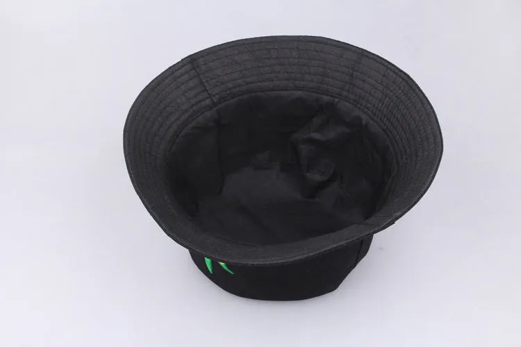 Black cotton twill fisherman hat with embroidered cartoon pattern, flat top and short brim, free size 56-58cm