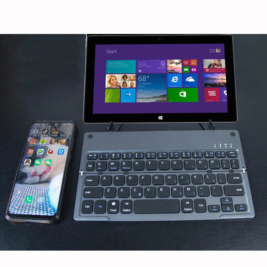 Folding Bluetooth keyboard with hidden bracket, touch-sensitive keys, rechargeable battery, Black or Silver