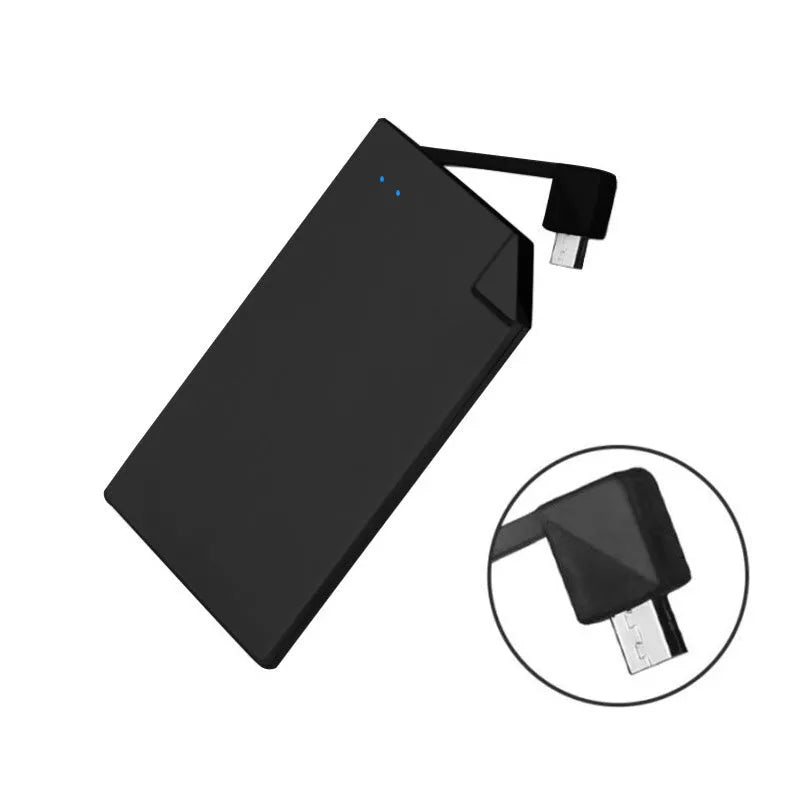 Silver ultra-thin 4mm graphene power bank next to a mobile phone showing its slim profile.