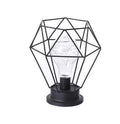 Minimalist hollow wrought iron table lamp in red wine bottle design with warm white LED light.