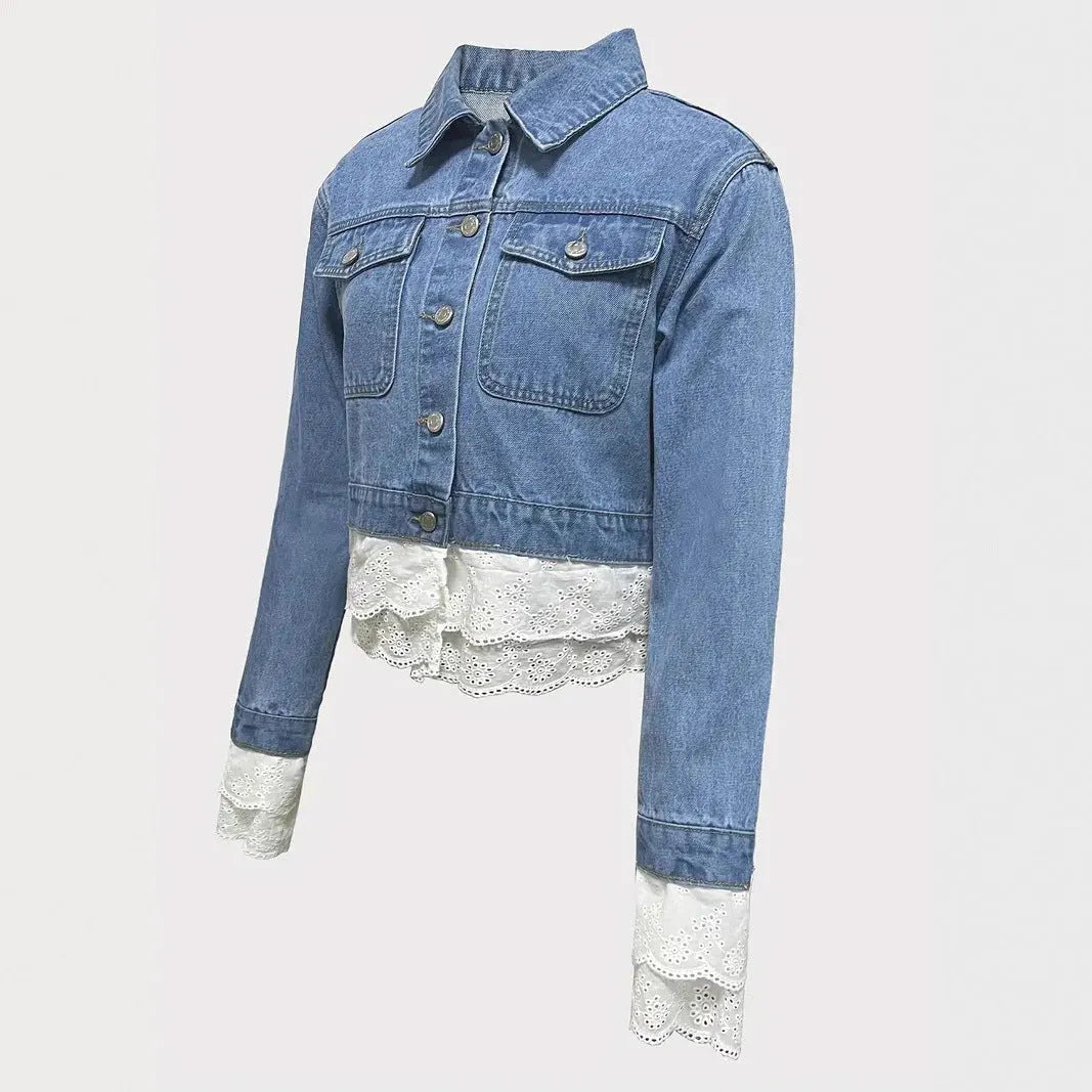 Blue women's denim jacket with lace stitching detail, shown on a hanger.