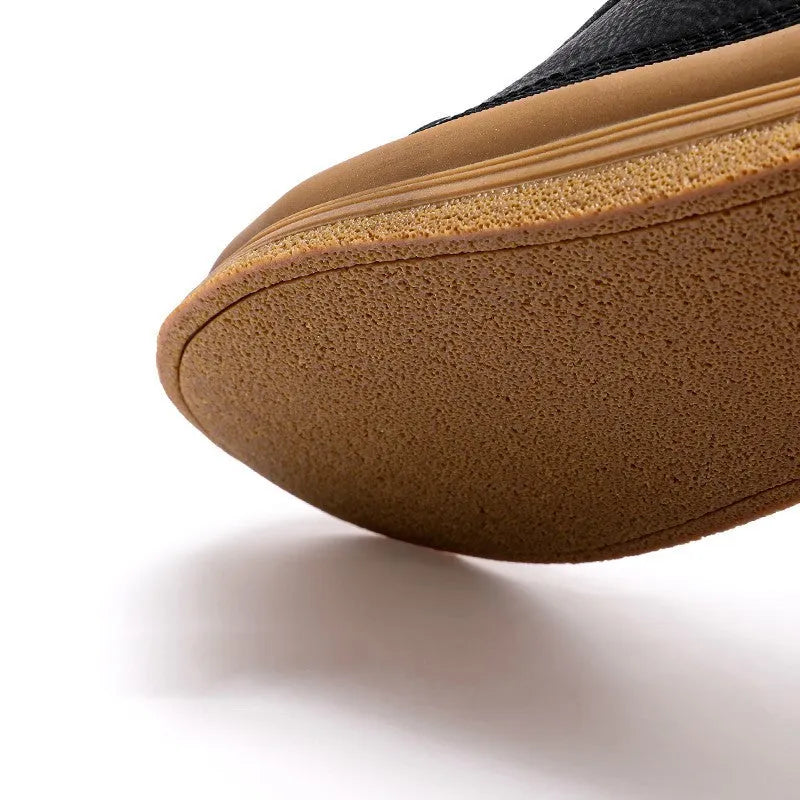 Men's black leather lace-up casual shoes with a round toe and flat rubber sole.