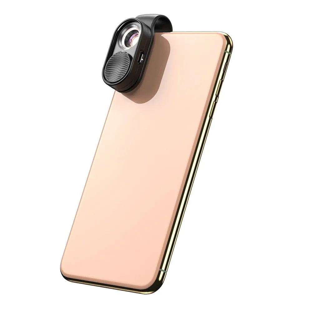 Black mobile magnification microscope with LED light clipped onto smartphone for macro photography