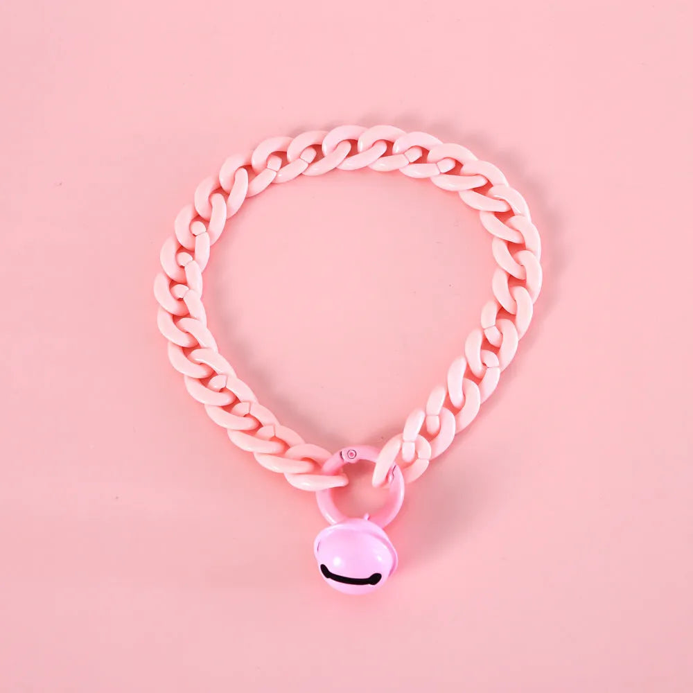 Adjustable plastic pet collar in candy chain blue colour on a white background, showing the monochrome pattern.