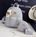 Women's three-piece PU leather bag set showing backpack, crossbody shoulder bag, and small card purse.