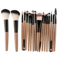 MAANGE 18-piece makeup brush set with fan brush displayed in clear hard storage case with individual slots.