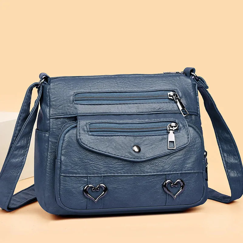 Soft PU crossbody shoulder bag with multi-pocket design in urban simplicity style, available in brown colour
