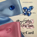 Blue and pink adjustable bow dog headdress hair band on a white background.