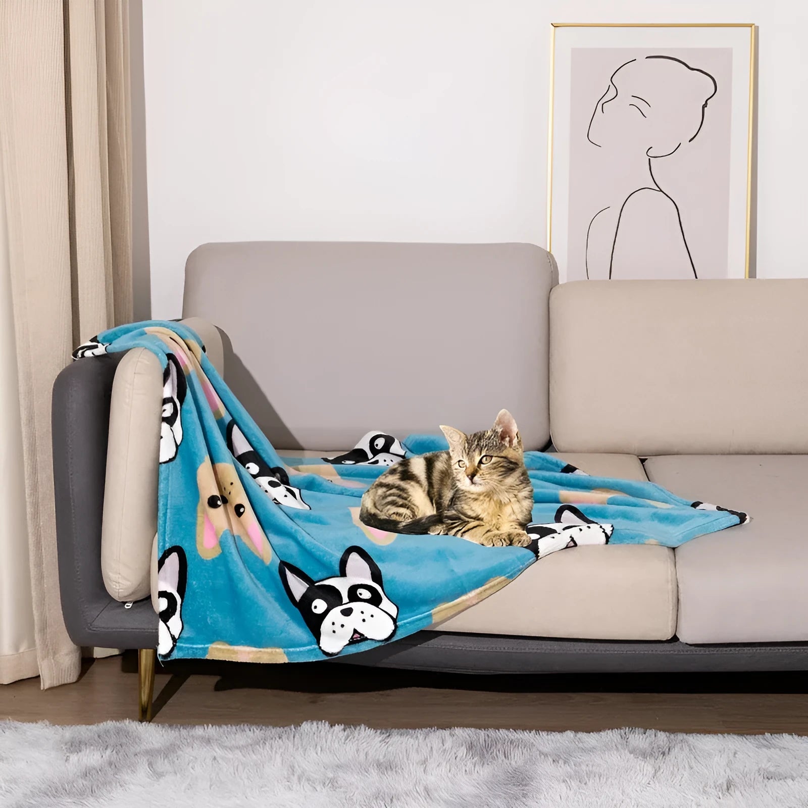 Blue dog cartoon print pet blanket laid flat, showing double-sided flannel texture.
