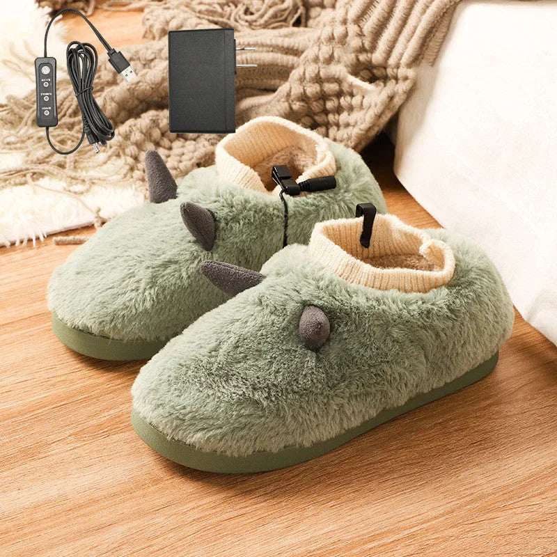 USB electric foot warmer slippers in grey with a connected USB cable on a wooden floor.