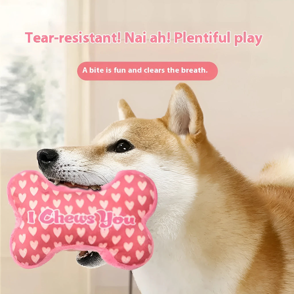 Plush dog chew toy with squeaker in bone pink colour on a white background