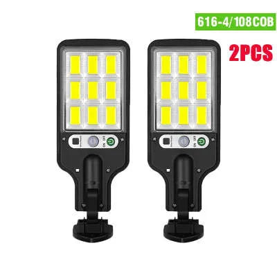 Outdoor solar LED wall lamp 28LED variant mounted on a garden fence for patio lighting