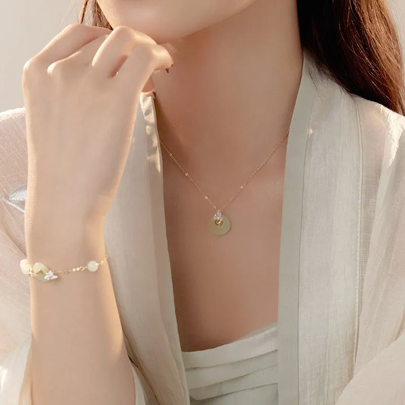 925 silver orchid necklace with peace buckle clasp and floral pendant on O-ring chain