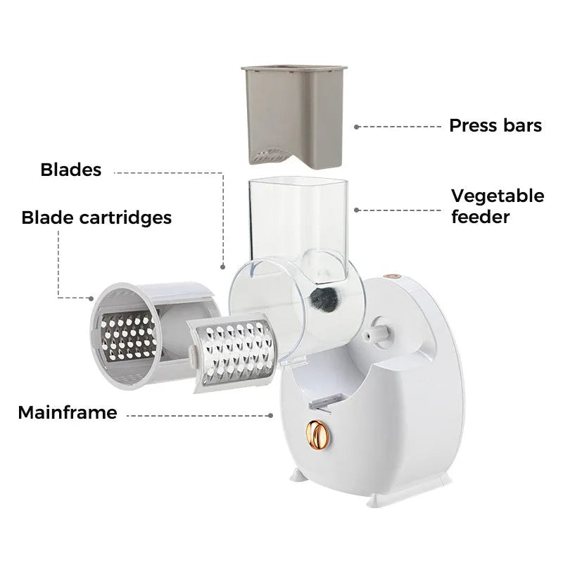 White electric vegetable slicer with rotary grater, blade barrel, and suction base on a kitchen counter.