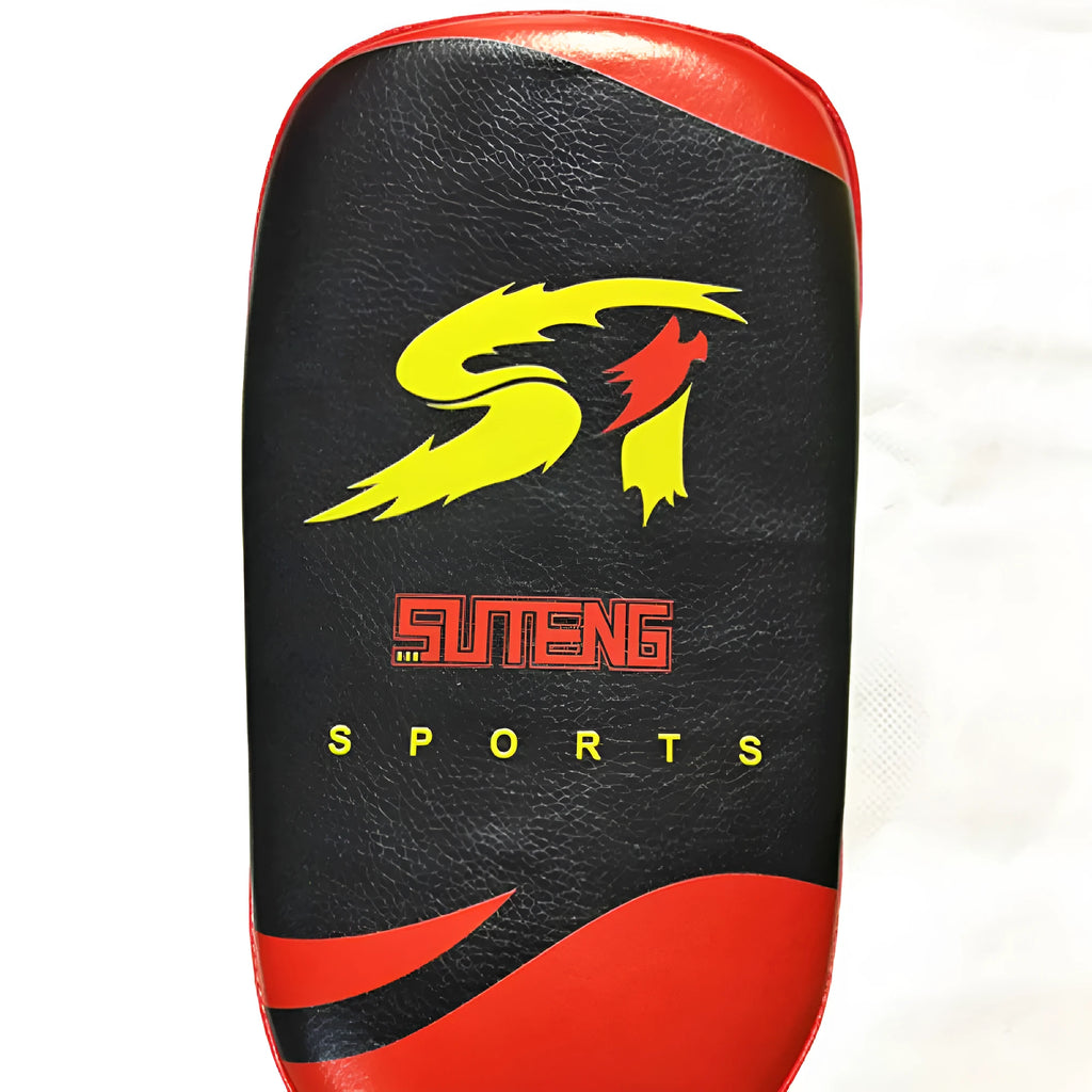Black with red edges PU leather hand-held boxing target pad showing adhesive buckle strap.