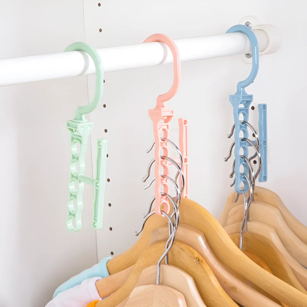 Blue revolving wardrobe hanger with five rotating branches and a central handle