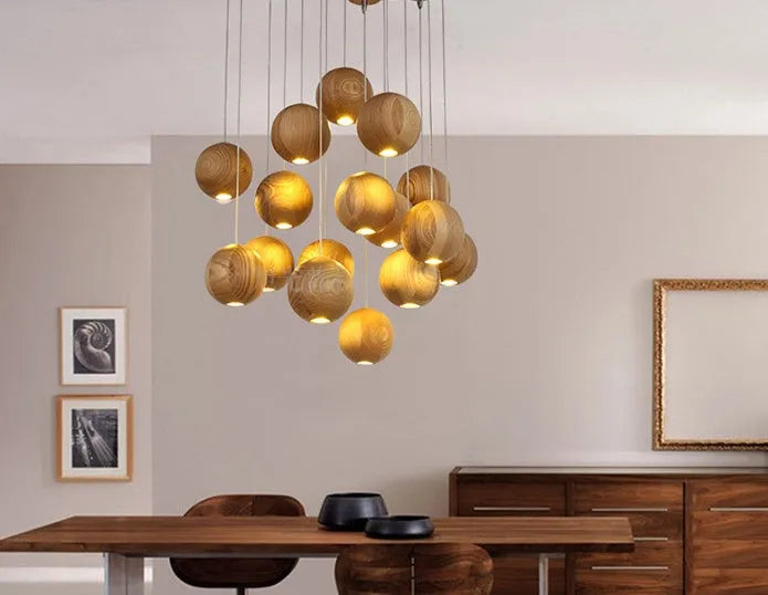 Nordic-style solid wood ball chandelier with adjustable cord and wood disc shade.