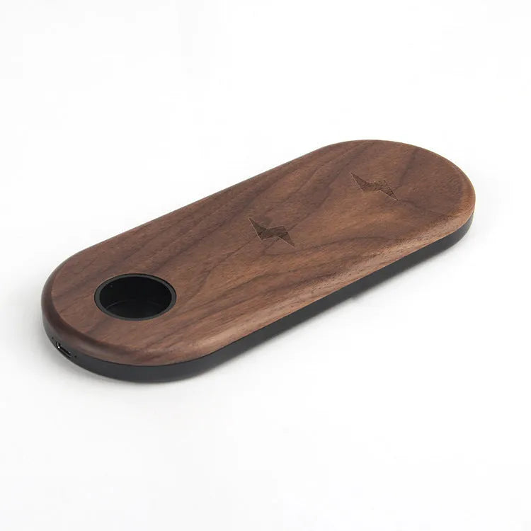 Wooden wireless charger with bamboo base and natural wood edging on desk surface