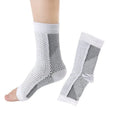 Pair of Korean-style short tube elastic pressure sports socks in nylon fabric, shown in white colour.