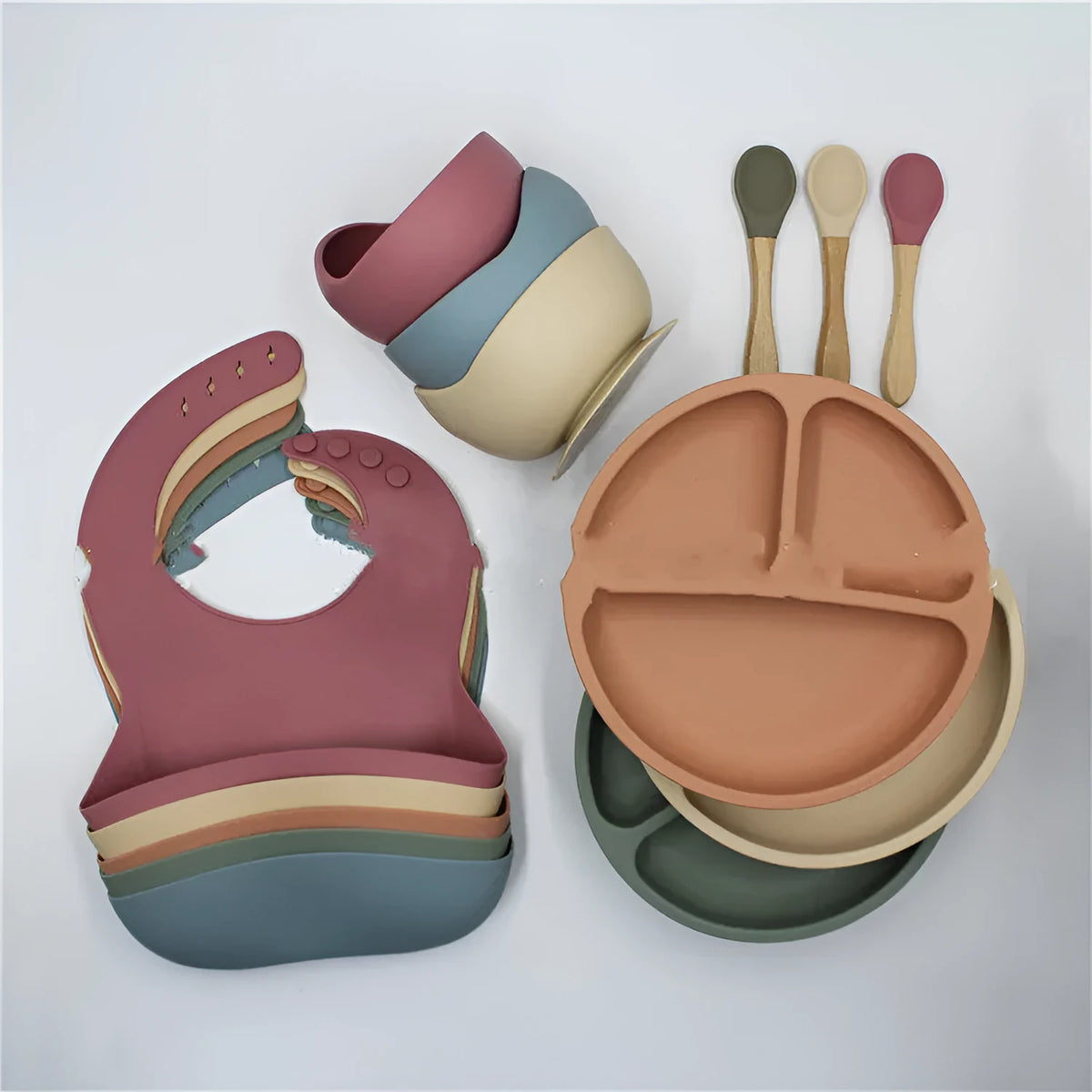 4 piece food grade silicone baby feeding set with bib, plate, bowl, and spoon in dark grey, khaki, or rose red