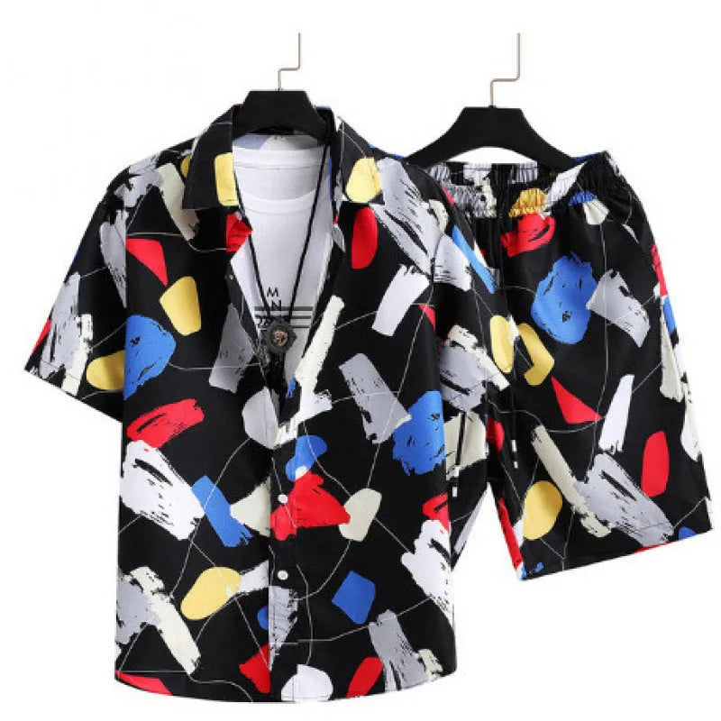 Man wearing a matching short sleeve cardigan and shorts set in a digital print pattern.