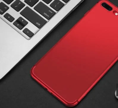 Black TPU silicone protective case fitted on an iPhone, showing precise cutouts for camera and ports.