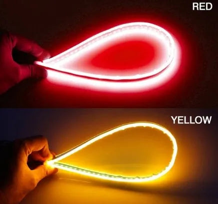60cm ultra-thin car LED tear light guide strip in white yellow two-colour mode on a dark background