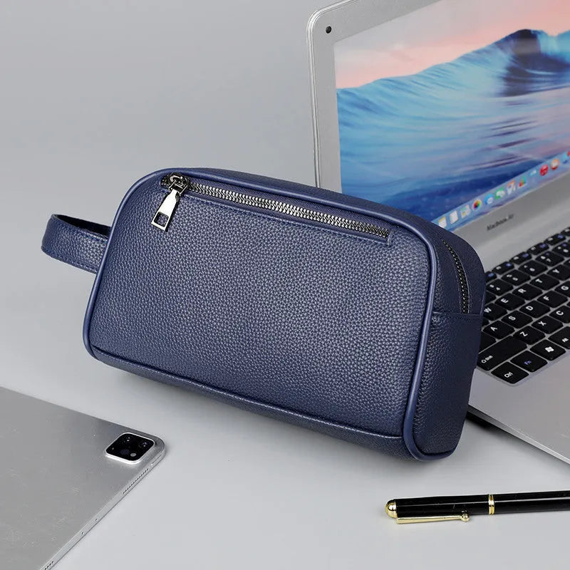 Men's solid colour business clutch bag in soft PU leather with visible sewing thread detail