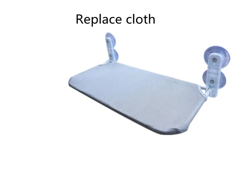 Foldable stainless steel cat hammock with grey plush cushion attached to a window with suction cups
