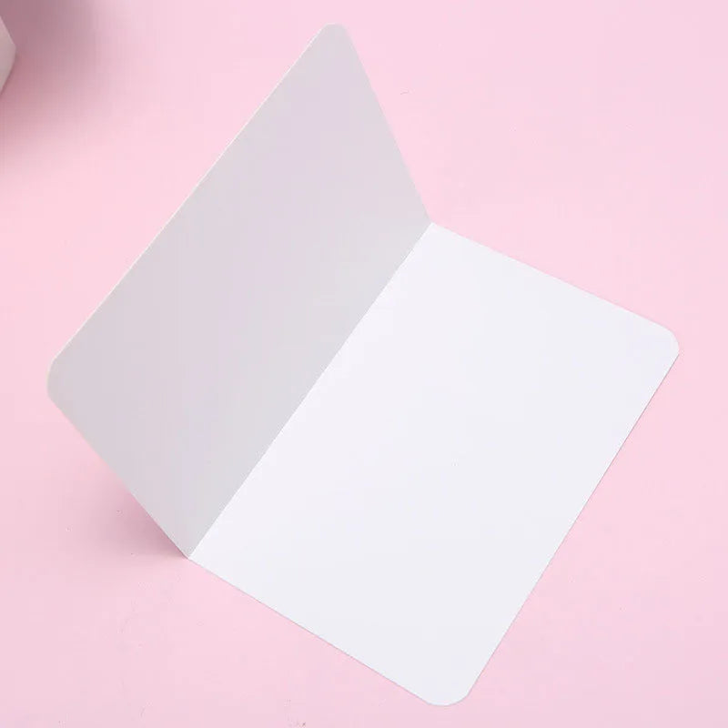 Folded kraft cards 10x15cm in black, cowhide, and white colours, 100 pack, blank surface for DIY invitations and crafts