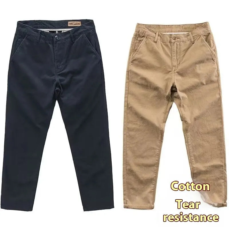Men's slim fit casual trousers in a grey washed fabric with a straight leg.