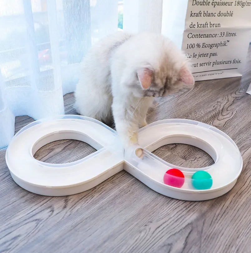 Cat toy turntable with a ball on a circular track, white and blue plastic, 50cm wide, for interactive play