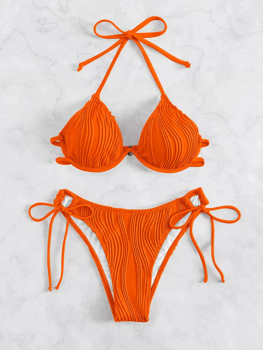 Women's apricot coloured bikini set with underwire cups and adjustable ties.
