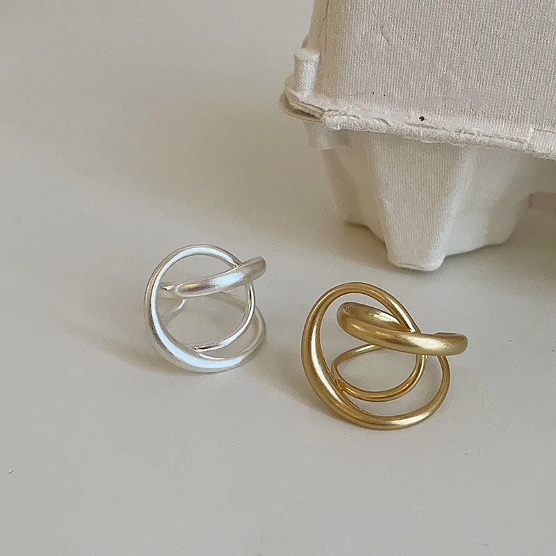 Three-dimensional interlaced geometric open ring in matte gold or silver electroplated finish