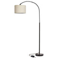 Modern minimalist fishing floor lamp with black fabric shade standing in a living room corner