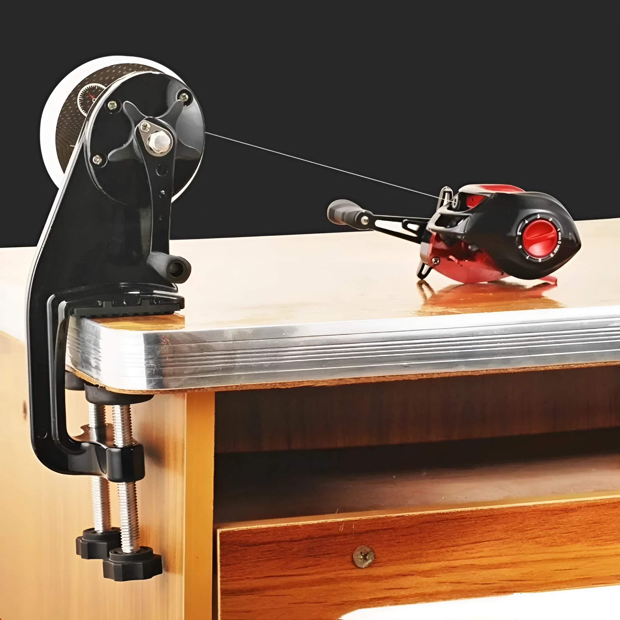 Portable fishing line wrapping device with composite fibre construction and extension shaft