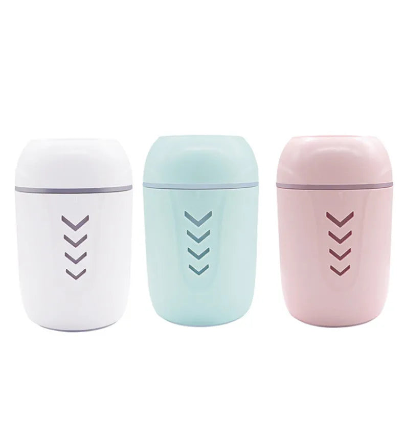 Blue columnar portable car humidifier with USB cable and 200ml water tank.