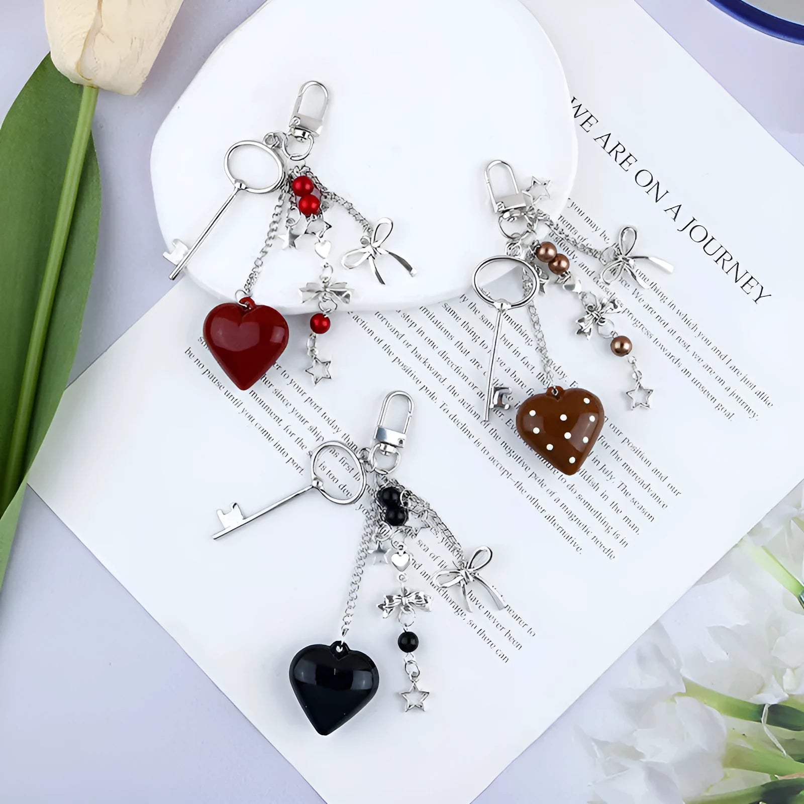 Retro zinc alloy key ring with bow and love heart chain design in multiple colour options