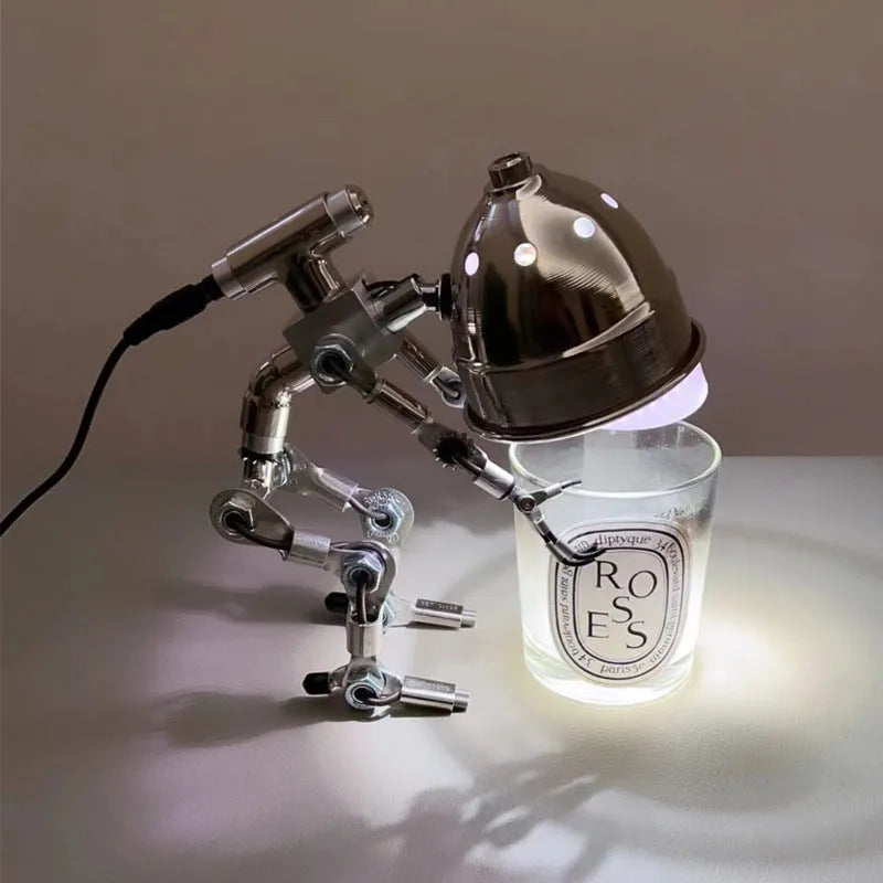 Robot-shaped desk lamp with metallic finish for study lighting