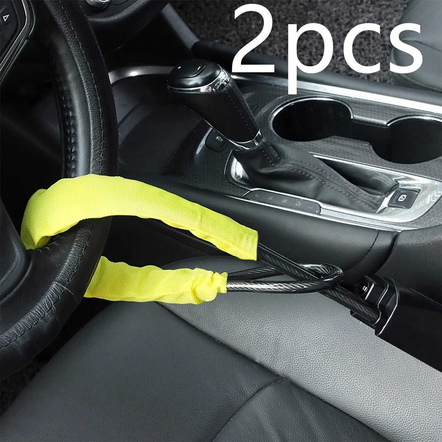 Red iron car steering wheel lock for General Motors vehicles on a steering wheel.