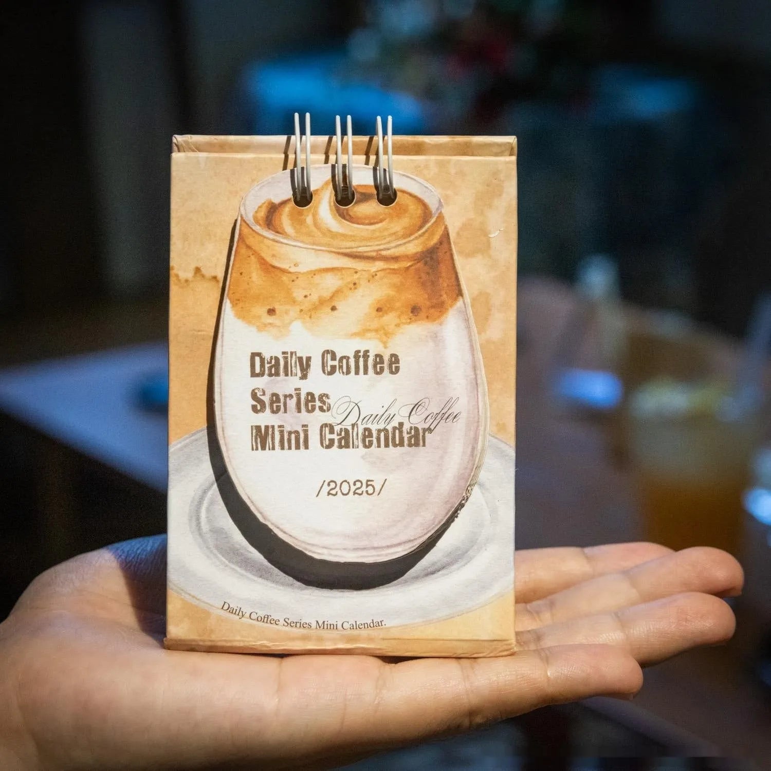 Mini 2025 desk calendar with themed designs for small desk spaces