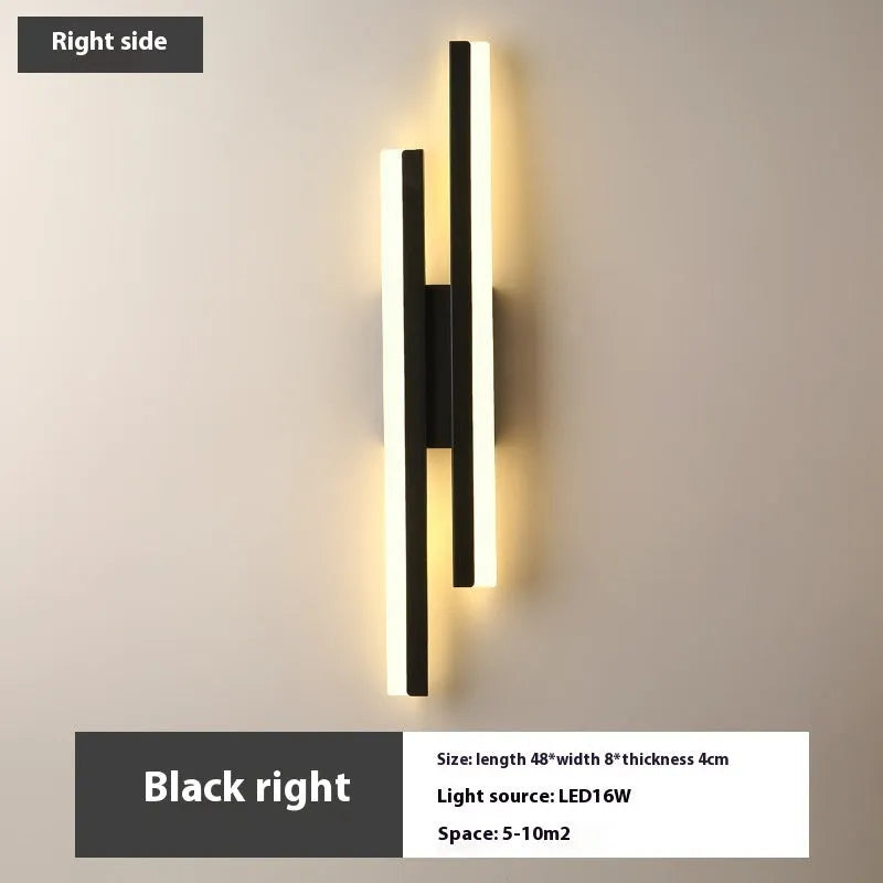 Minimalist Scandinavian-style LED wall light with acrylic shade in black or gold finish