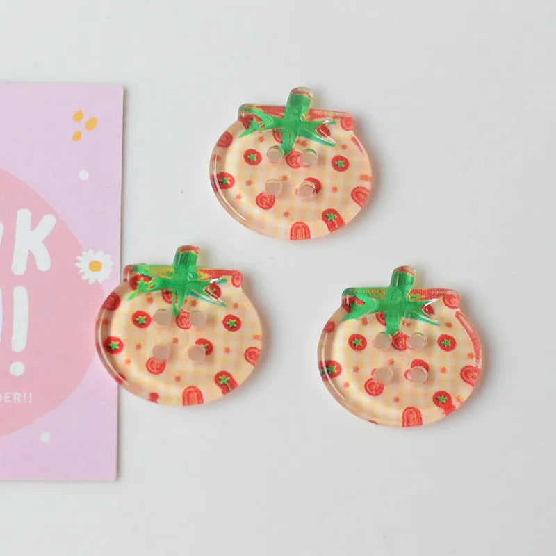 Medium plastic tomato button ornaments with printed patterns in various red colour options