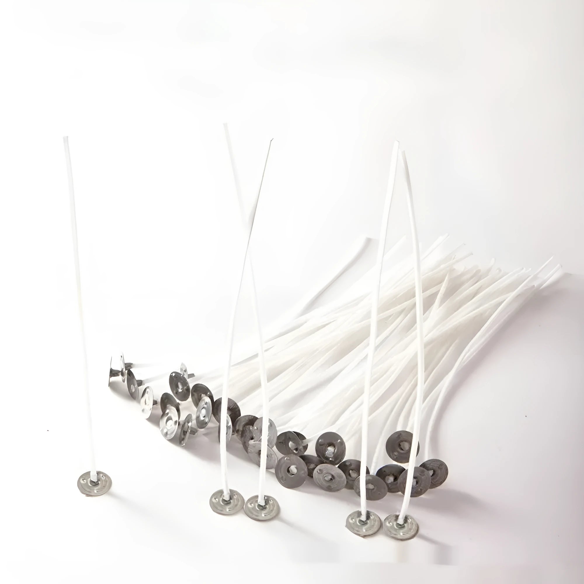 White cotton candle wicks in three different lengths for DIY candle making projects
