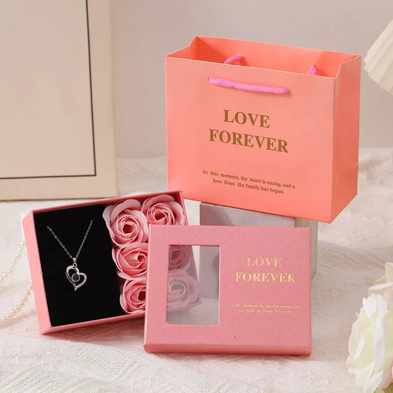 Soap flower gift set with six roses in a red Korean-style box, includes a handbag.