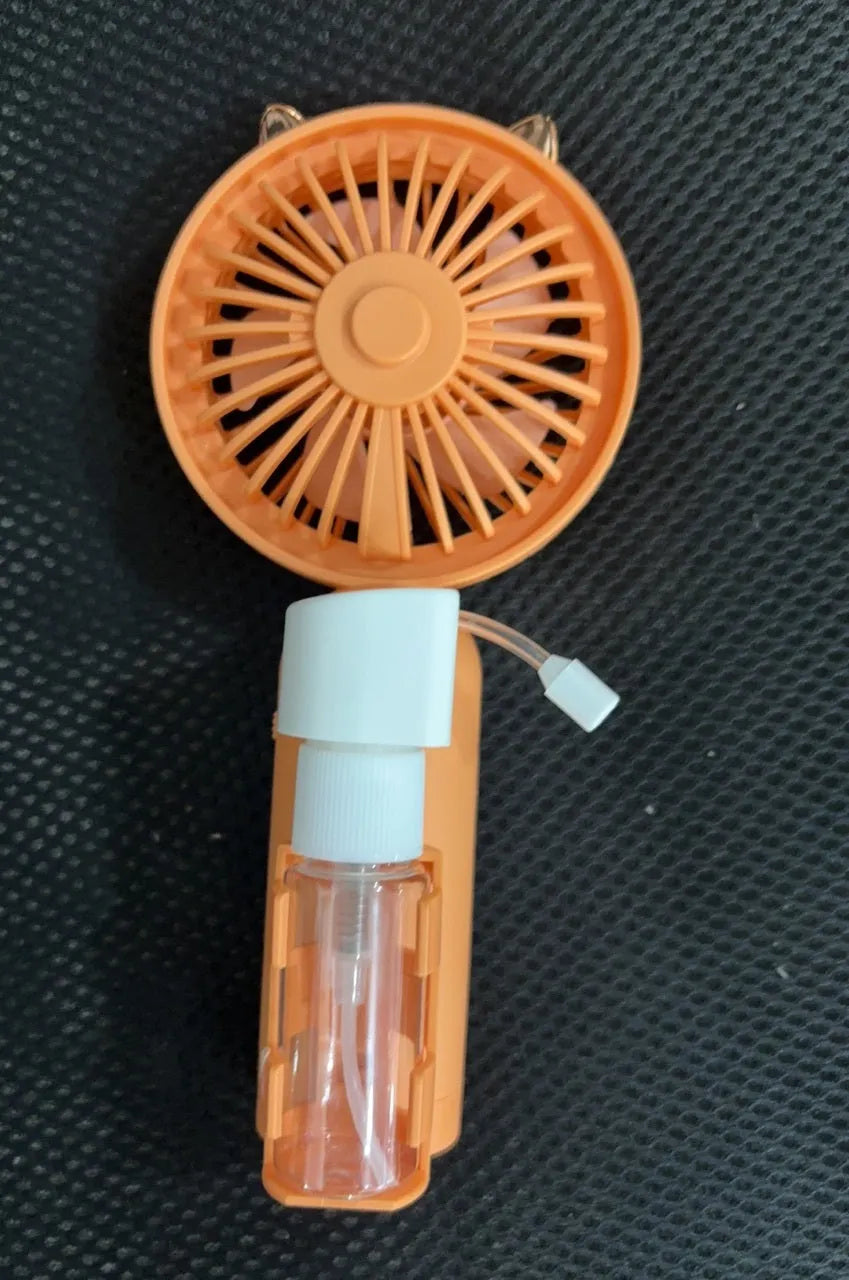 Portable plastic USB desk fan in a choice of apricot, blue, green, orange, or pink colours.