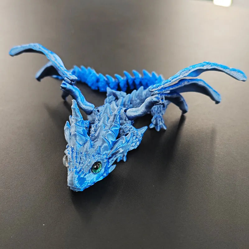 Red and gold PLA flying dragon wings decoration toy measuring 25cm wide.