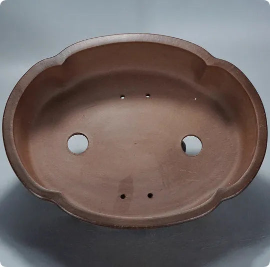 Large classic purple clay flower pot for plants or bonsai, shown from the side.