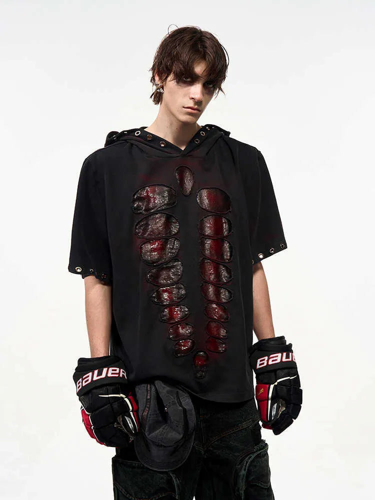 Black loose-fit men's hooded sequin T-shirt on a hanger